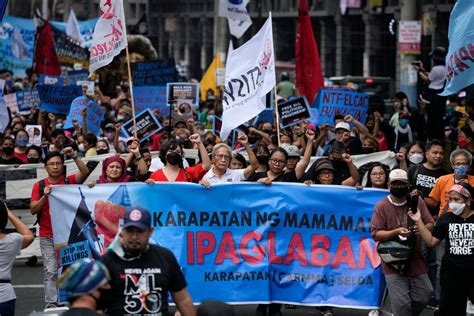 Philippines protesters decry alleged injustices under Marcos .